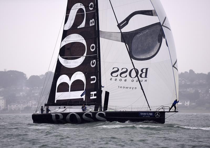 Hugo Boss on day 6 of Aberdeen Asset Management Cowes Week photo copyright Rick Tomlinson / www.rick-tomlinson.com taken at Cowes Combined Clubs and featuring the IMOCA class