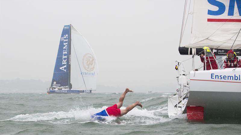 Sylvain Marconnet dives into the Solent off the SMA boat during the Artemis Challenge photo copyright Mark Lloyd / www.lloyd-images.com taken at Cowes Combined Clubs and featuring the IMOCA class