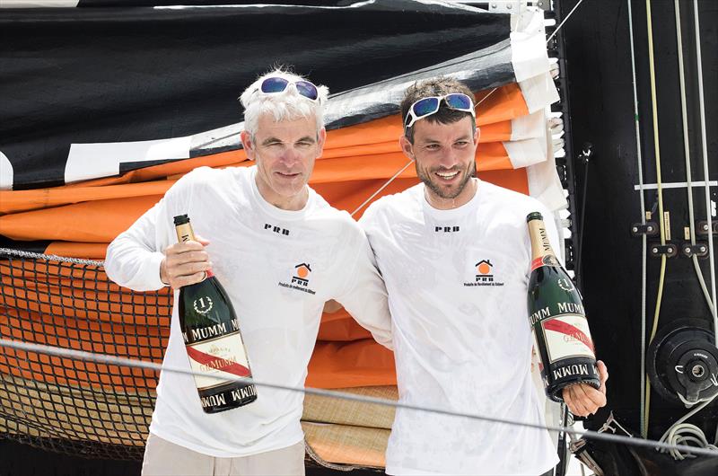 Vincent Riou and Sebastien Col  celebrate winning the Transat Jacques Vabre IMOCA class photo copyright Jean Marie Liot taken at  and featuring the IMOCA class