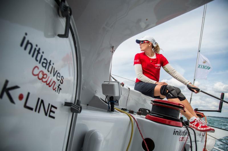 Sam Davies racing on Tanguy de Lamotte's IMOCA 60 Initiatives Coeur approaches Land's End in the 47th Rolex Fastnet Race photo copyright Initiatives Coeur taken at Royal Ocean Racing Club and featuring the IMOCA class