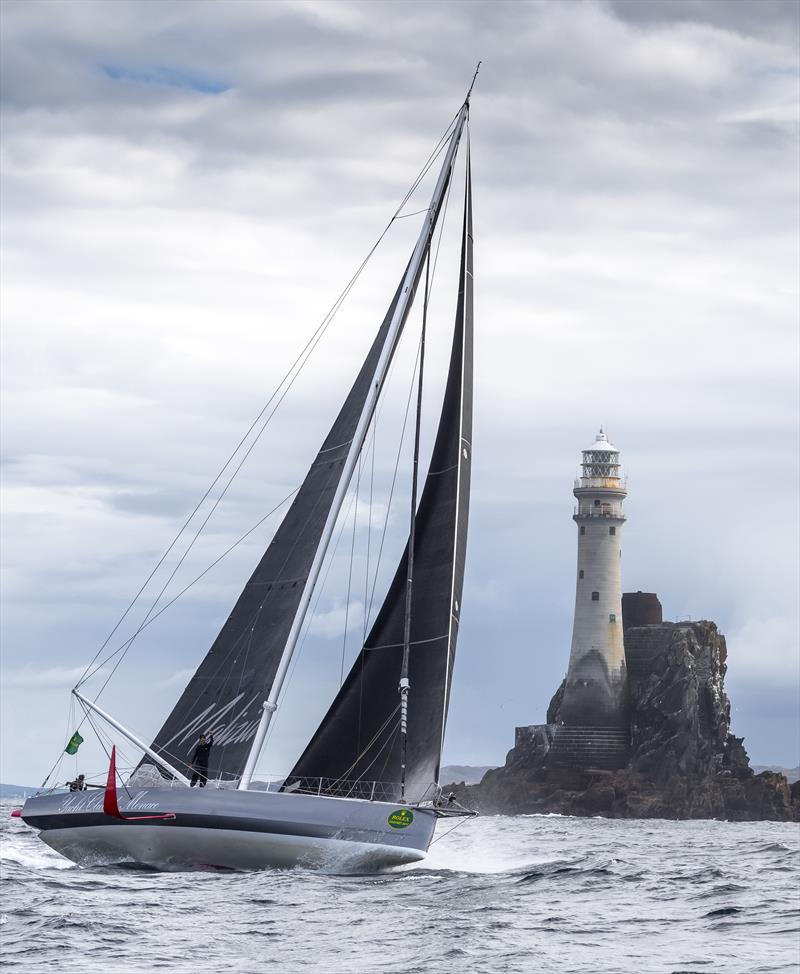 IMOCA 60 Malizia - Yacht Club de Monaco rounds the rock in the Rolex Fastnet Race photo copyright Rolex / Kurt Arrig taken at Royal Ocean Racing Club and featuring the IMOCA class
