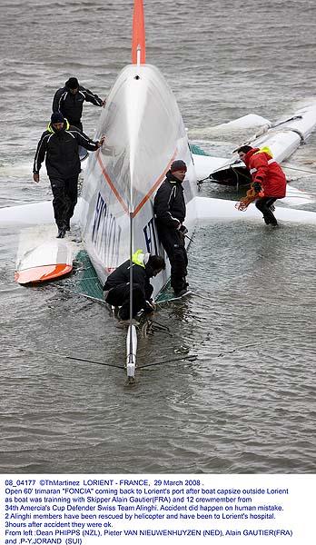 “FONCIA” was training in 20 knots of wind when she capsized photo copyright Thierry Martinez / www.thmartinez.com taken at  and featuring the IMOCA class