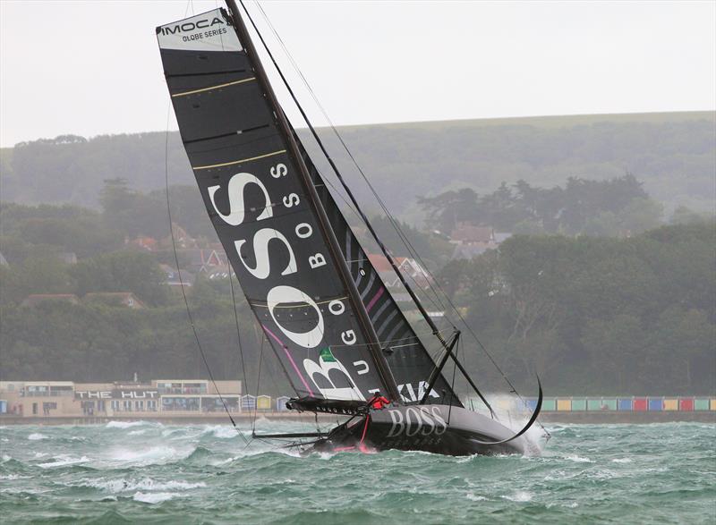 Hugo Boss passes Hurst Castle after the Rolex Fastnet Race start - photo © Mark Jardine