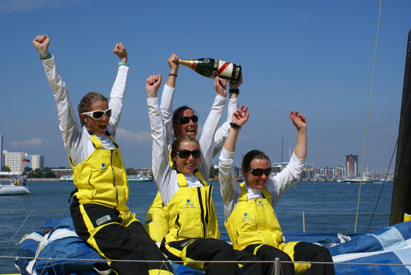 Dee Caffari and her all female crew onboard Aviva celebrate breaking the round Britain and Ireland record photo copyright Rachel Dobrijevic taken at  and featuring the IMOCA class
