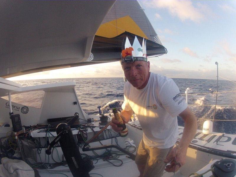 Mike Golding on his 22nd crossing of the Equator makes sacrifice to Neptune
