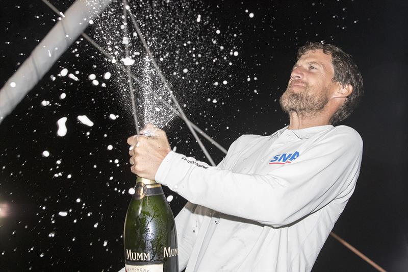Paul Meilhat (SMA) enjoying his champagne moment after winning the IMOCA class in the Route du Rhum-Destination Guadeloupe photo copyright Alexis Courcou taken at  and featuring the IMOCA class