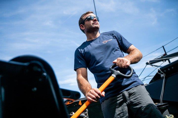 Charlie Enright racking up helm time aboard the team's new IMOCA 60 monohull photo copyright Amory Ross/11th Hour Racing taken at  and featuring the IMOCA class