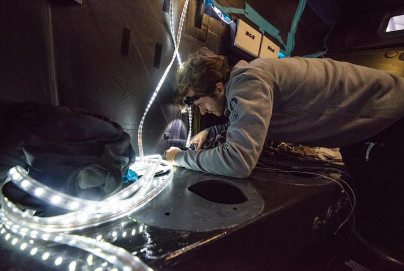 Flexible LED light strings aid repair work in the black carbon created darkness below decks- Hugo Boss - Keel and boat repairs following TJV incident - November 4, 2019 - Canary Islands photo copyright Alex Thomson Racing taken at  and featuring the IMOCA class