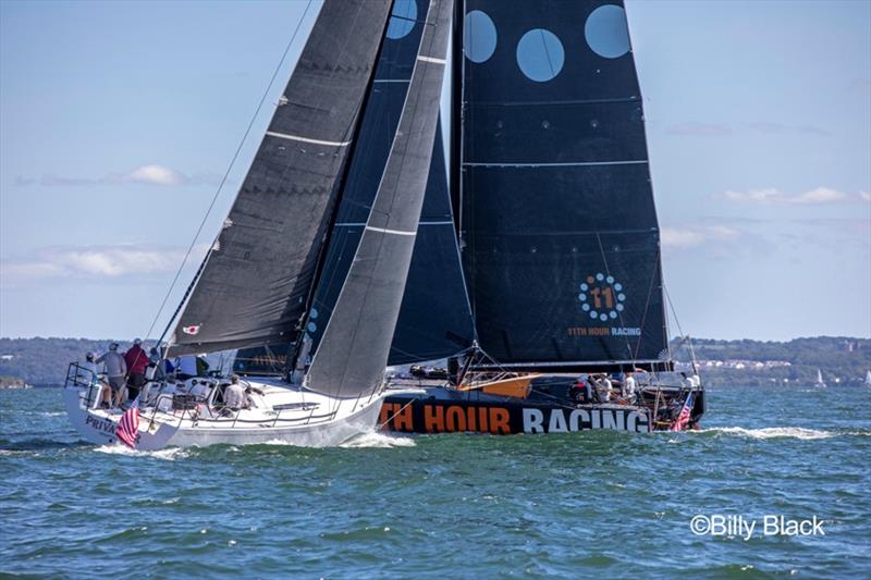 Ron O'Hanley's Cookson 50 Privateer meets the 11th Hour Racing Team IMOCA 60 during an around Jamestown, RI race photo copyright Billy Black taken at  and featuring the IMOCA class