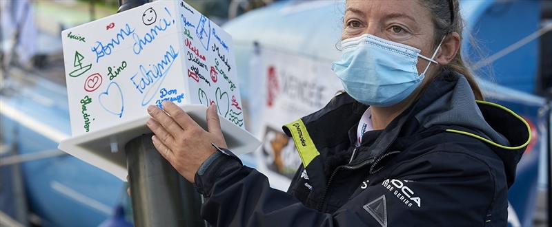 Meteo France is providing sustainability indicators buoys for skippers to immerse at specific waypoints, here Alexia Barrier, during the Vendée Globe prestart in les Sables d'Olonne, France, on October 21, 2020 photo copyright Yvan Zedda / Alea taken at  and featuring the IMOCA class