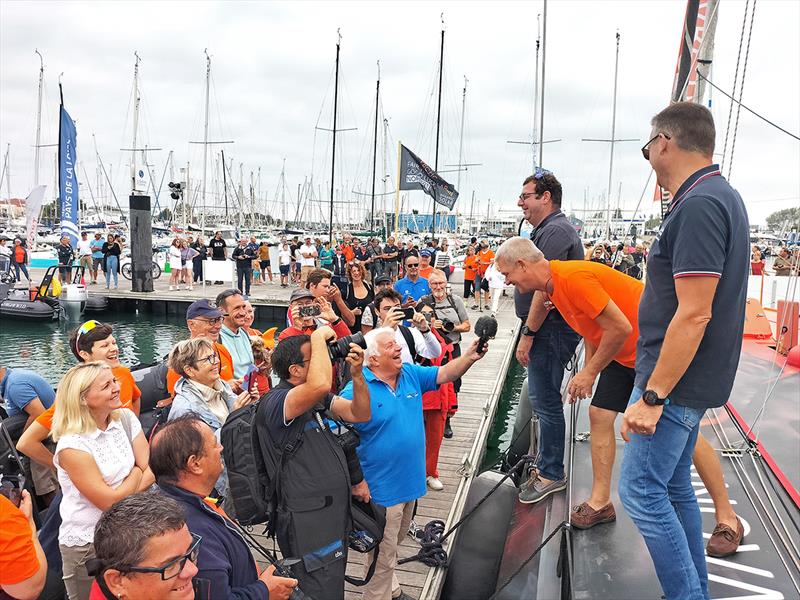 Norbert having interviews before leaving the Vendée Globe pontoon - ANT ARCTIC LAB photo copyright Innovation Yachts taken at  and featuring the IMOCA class