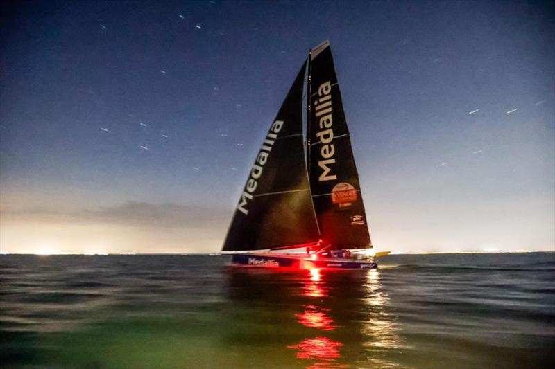 Pip Hare's IMOCA Medallia takes line honours in the Sevenstar Round Britain and Ireland Race photo copyright Paul Wyeth / pwpictures.com taken at Royal Ocean Racing Club and featuring the IMOCA class