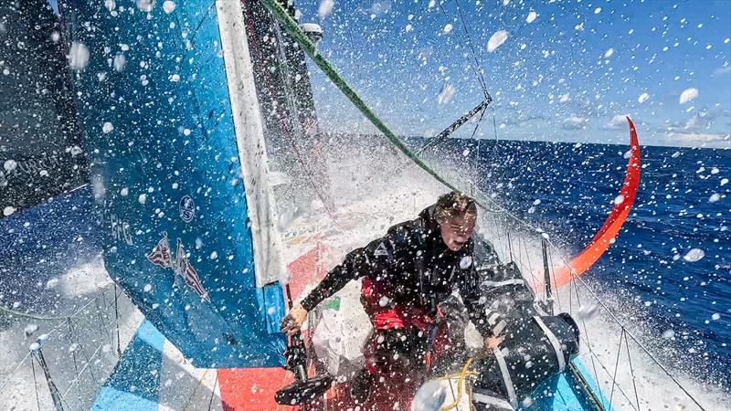 6 February 2023, Leg 2, Day 12 onboard Team Malizia. Rosalin Kuiper under a wave one deck photo copyright Antoine Auriol / Team Malizia taken at  and featuring the IMOCA class