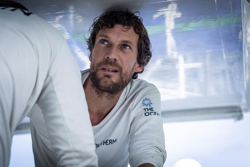 The Ocean Race 6 February 2023, Leg 2, Day 13 onboard Biotherm. Paul Meilhat trimming the sail photo copyright Anne Beauge / Biotherm taken at  and featuring the IMOCA class