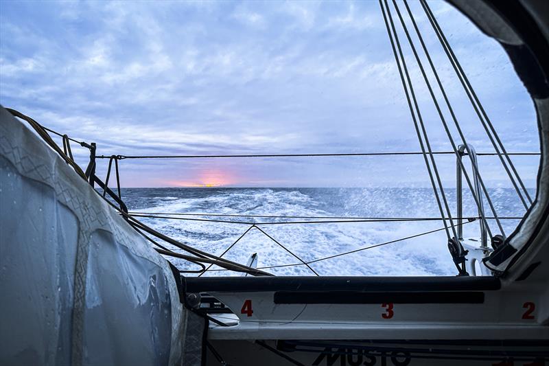 The Ocean Race 2022-23 Leg 3, day 18 onboard 11th Hour Racing Team. The sun pushes through the thick clouds to the west - the first sighting of the sun in a week - to end the day - photo © Amory Ross / 11th Hour Racing / The Ocean Race