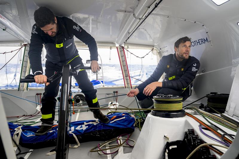 The Ocean Race 2022-23 Leg 3, Day 22 onboard Biotherm. Anthony Marchand and skipper Paul Meilhat trimming the sails in the cockpit photo copyright Ronan Gladu / Biotherm / The Ocean Race taken at  and featuring the IMOCA class