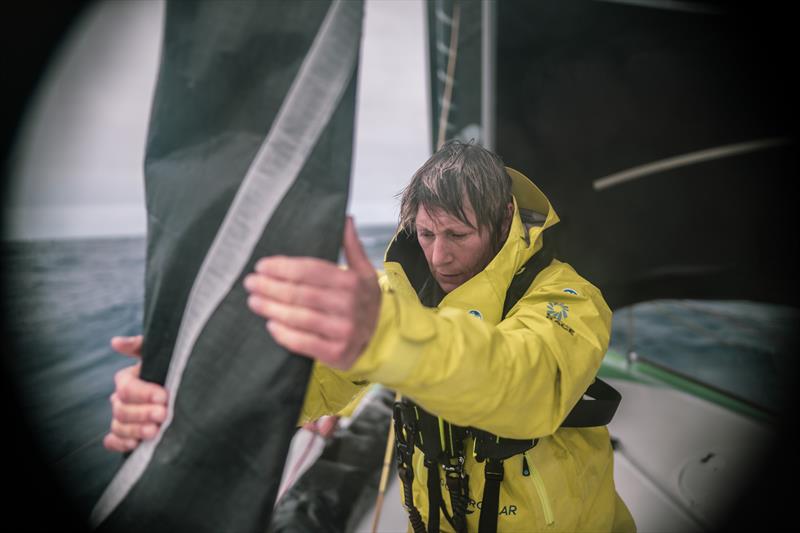 The Ocean Race 2022-23 Leg 3 day 25 onboard Team Holcim - PRB. Abby Ehler working on the sails on deck - photo © Julien Champolion | polaRYSE / Holcim - PRB / The Ocean Race