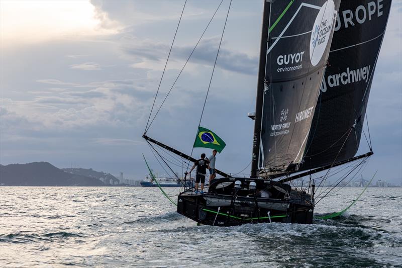 The Ocean Race 2022-23 - 30 March 2023. GUYOT environnement - Team Europe arrives in Itajaí. After a repair on the hull, the boat was delivered across the Atlantic photo copyright Alexander Champy-McLean / The Ocean Race taken at  and featuring the IMOCA class