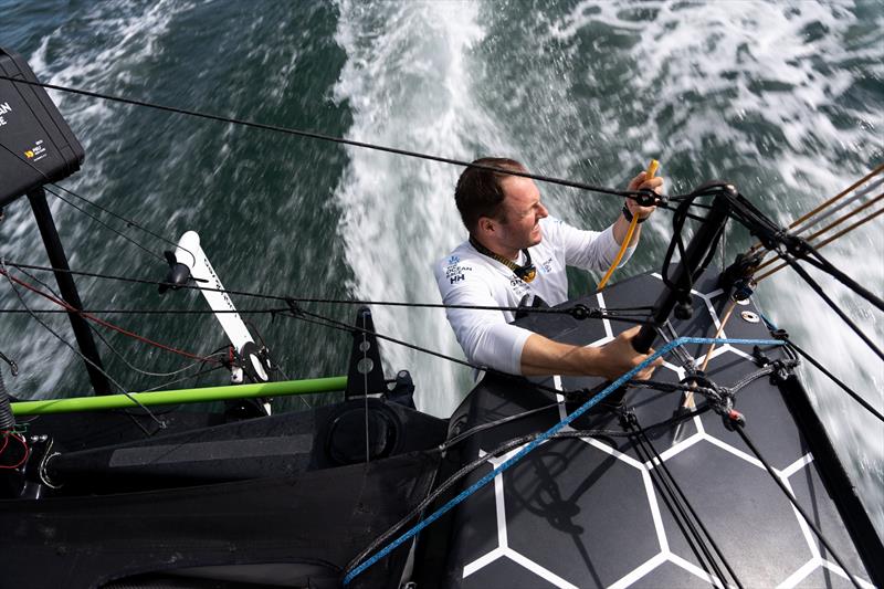 The Ocean Race 2022-23 Leg 4 onboard GUYOT environnement - Team Europe. Robert Stanjek changing and adjusting some sheets at the stern - photo © Gauthier Lebec / GUYOT environnement - Team Europe / The Ocean Race