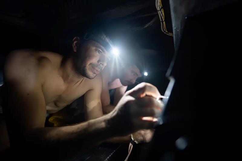 Sébastien Simon and Benjamin Dutreux have to look into the depths of the yacht to find the damaged rope - photo © Gauthier Lebec / GUYOT environnement - Team Europe