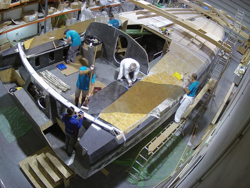 Lamination of the deck of IY Open60AAL in Innovation Yachts' Shipyard photo copyright Innovation Yachts taken at  and featuring the IMOCA class