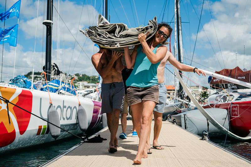 Skippers and crew members are working on the boats during pre-start of the solo sailing race Retour à La Base, in Fort de France, Martinique, on November 25 - photo © Jean-Louis Carli / Alea / Retour à La Base