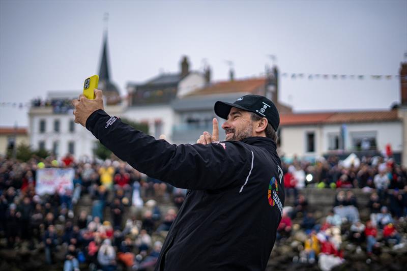 Boris Herrmann visibly enjoying the crowds as Malizia - Seaexplorer exited the Port Olona channel - photo © Marie Lefloch / Team Malizia