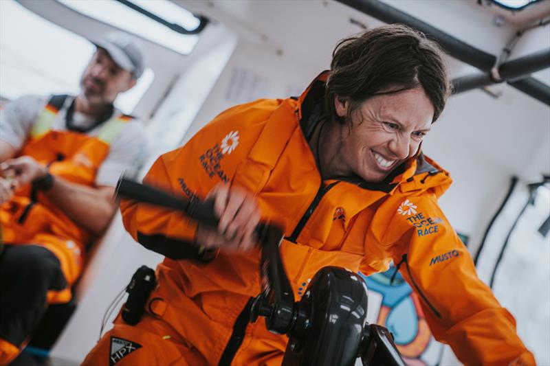 Francesca Clapcich grinds the winches onboard 11th Hour Racing Team's IMOCA photo copyright Amory Ross 11th Hour Racing The Ocean Race taken at Corinthian Yacht Club of Bellingham and featuring the IMOCA class