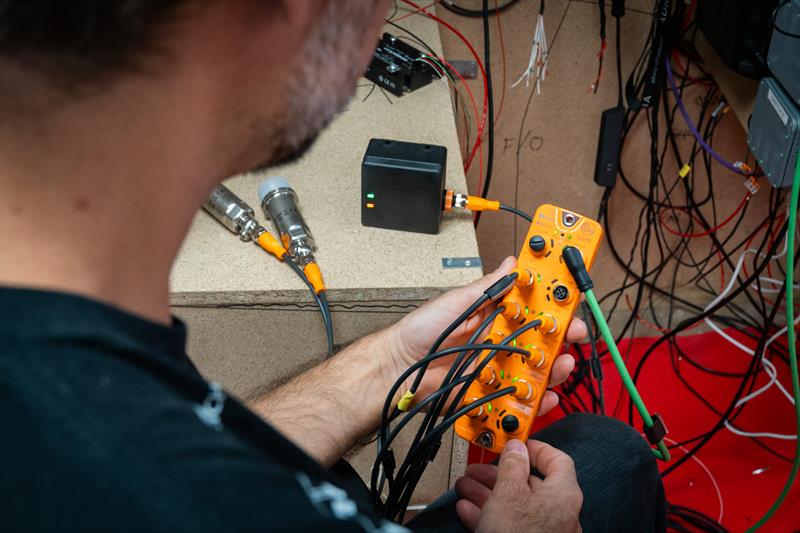 Boris Herrmann with an ifm sensor during the new build of Team Malizia's next IMOCA - photo © Flore Hartout | Team Malizia