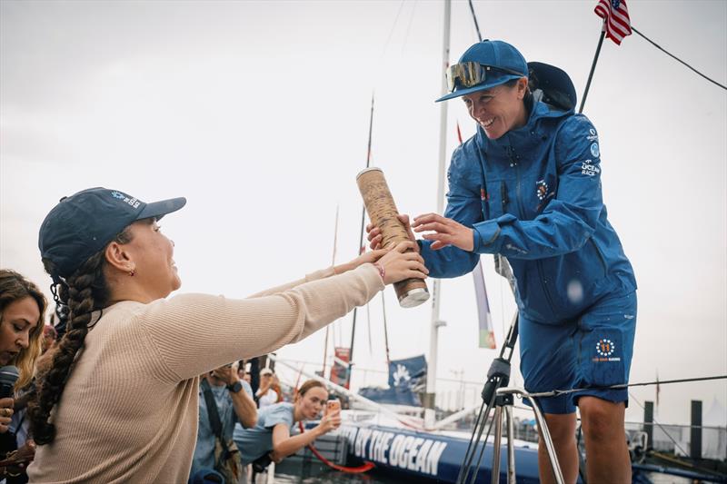 Bailey Bass the Ocean Impact Ambassador for The Ocean Race hands over Nature's Baton for Francesca Clapcich, skipper of the 11th Hour Racing boat photo copyright Vincent Curutchet / The Ocean Race taken at  and featuring the IMOCA class