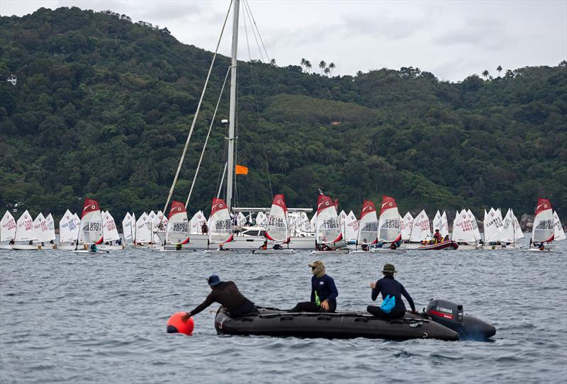 Phuket King's Cup 2022: O'pen Skiff start. Optimists waiting photo copyright Guy Nowell / Phuket King's Cup taken at Phuket Yacht Club and featuring the O'pen Skiff class