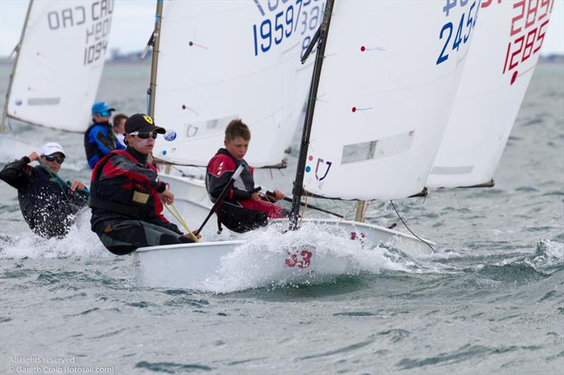 Enzo Balanger (FRA 2454) on the fifth day of the Optimist European Championships on Dublin Bay photo copyright Gareth Craig / www.fotosail.com taken at Royal St George Yacht Club and featuring the Optimist class