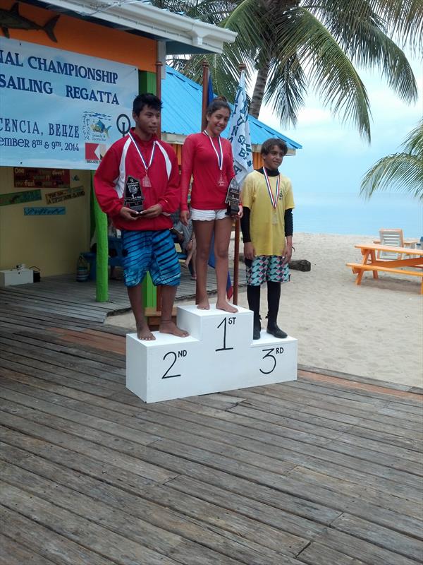 Belize Optimist Championship podium (l to r) Chritian Trejo of SPJSC (2nd), Blanca Velasquez (1st), Trent Hardwick of Belize Sea Scouts (3rd) photo copyright Shelley Bradley taken at Belize Sailing Association and featuring the Optimist class