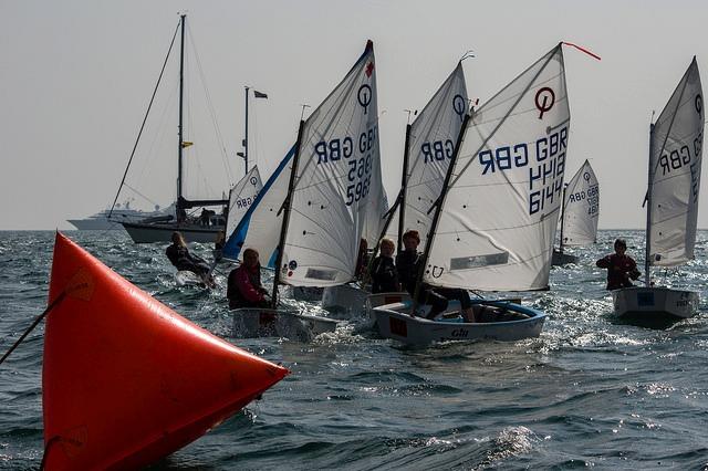 Optimists start at the 2014 UBS Jersey Regatta  photo copyright Louise Bennett-Jones & Simon Ropert taken at Royal Channel Islands Yacht Club and featuring the Optimist class