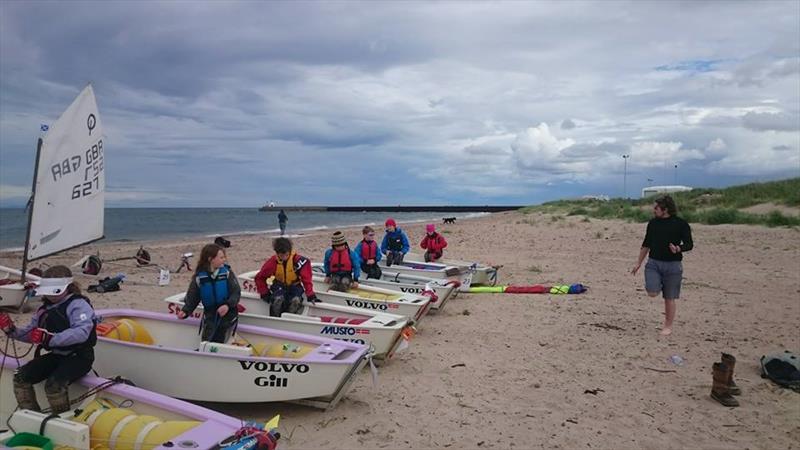 Rigging during the Scottish Optimist Traveller at Nairn photo copyright Alec Munro taken at Nairn Sailing Club and featuring the Optimist class