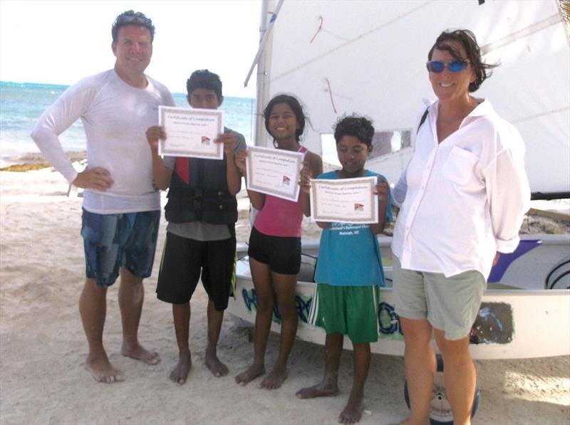 Optimist Level 1 certificates awarded at Adelle's International Outreach Programme (l-r) Ernie Martin ( instructor), Emmanuel Avillez, Stephanie Avilez, Junior Avilez, Joy White (instructor) photo copyright SPSC taken at San Pedro Sailing Club and featuring the Optimist class