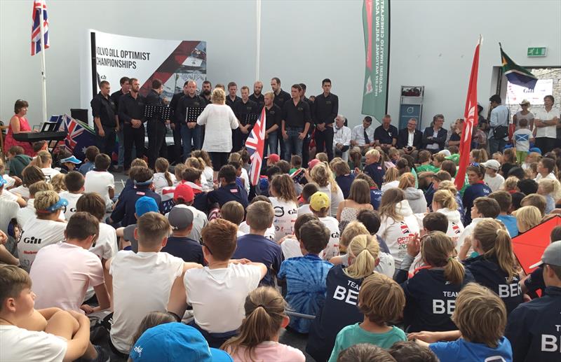 Opening ceremony with choir at the Volvo Gill Optimist British Nationals photo copyright Paula Irish taken at Plas Heli Welsh National Sailing Academy and featuring the Optimist class