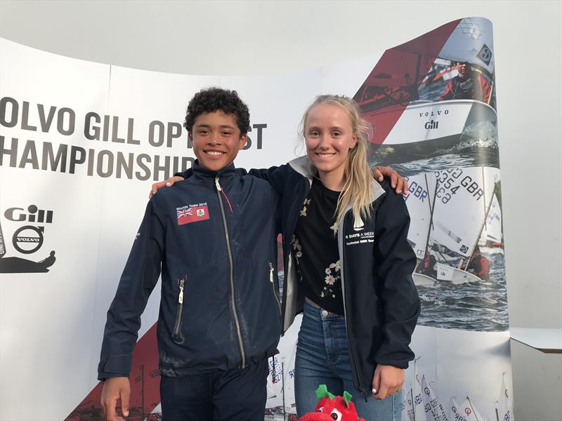 Volvo Gill Optimist British Nationals overall winner Christian Ebbin from Bermuda and British champion Emily Mueller photo copyright Andy Green / www.greenseaphotography.co.uk taken at Plas Heli Welsh National Sailing Academy and featuring the Optimist class