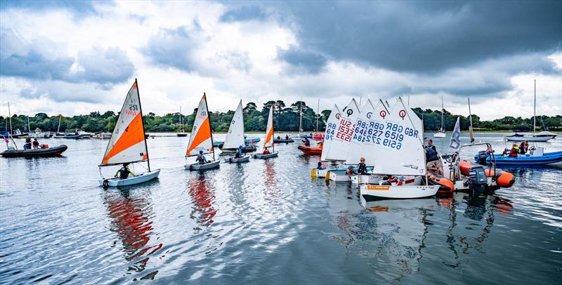 Launching during the Lymington Junior Regatta photo copyright Dan Howe taken at Royal Lymington Yacht Club and featuring the Optimist class