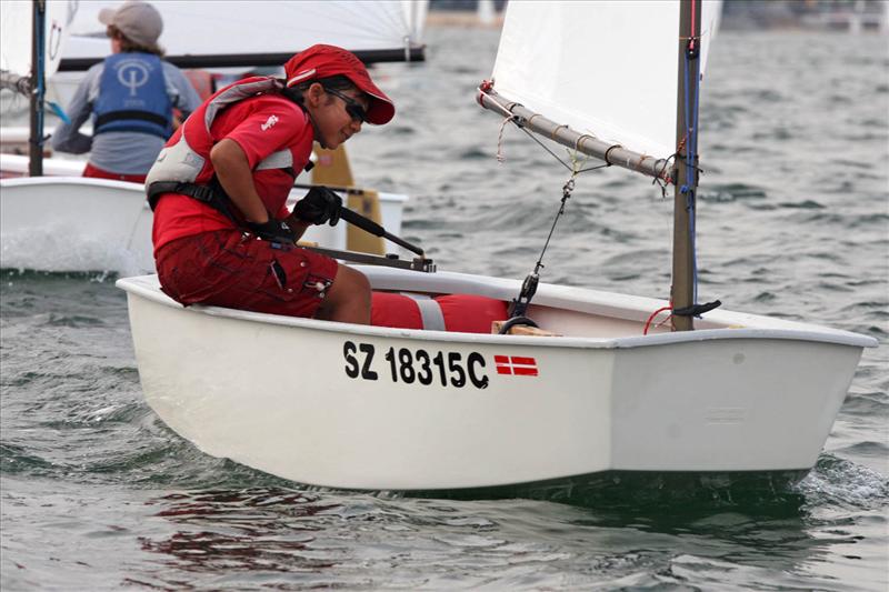 Singapore's Elisa Yukie Yokoyama leads the fleet after the first race of the Sentosa Championship photo copyright Singapore Sailing taken at  and featuring the Optimist class