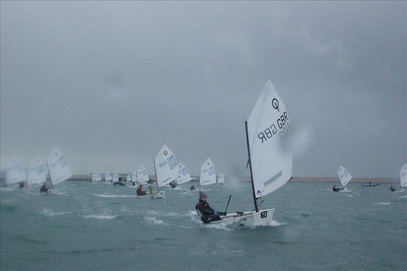 Max Moyles leads the fleet downwind at the Optimist Joint Squads weekend in Weymouth photo copyright Alan Williams taken at Weymouth & Portland Sailing Academy and featuring the Optimist class