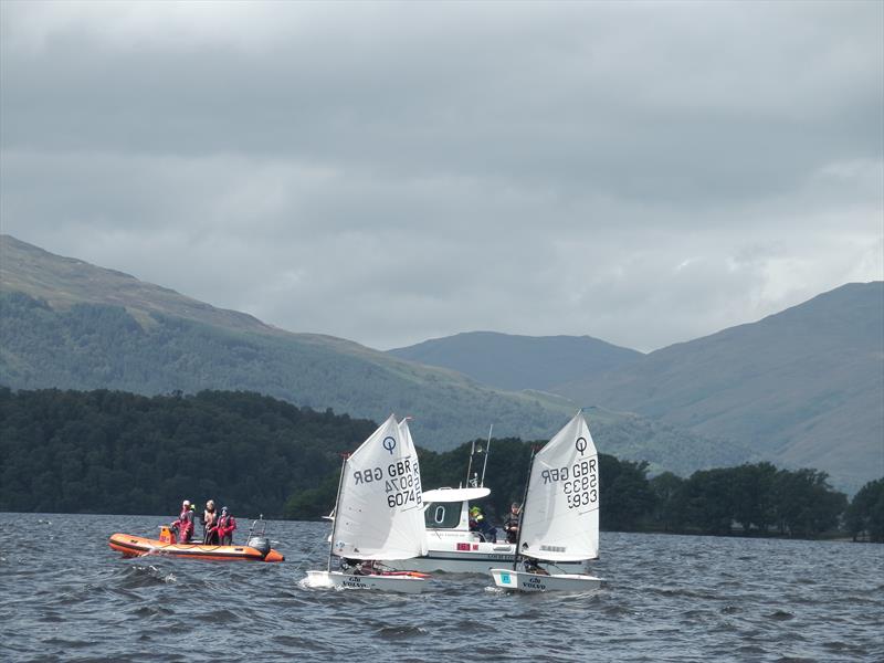 Stiff competition between Henry Kerr, Hannah Scott and Scott Forbes as the Optimists do battle during the RYA Scotland Champions Club and Windward Mark Trophies photo copyright Matt Toynbee taken at Loch Lomond Sailing Club and featuring the Optimist class