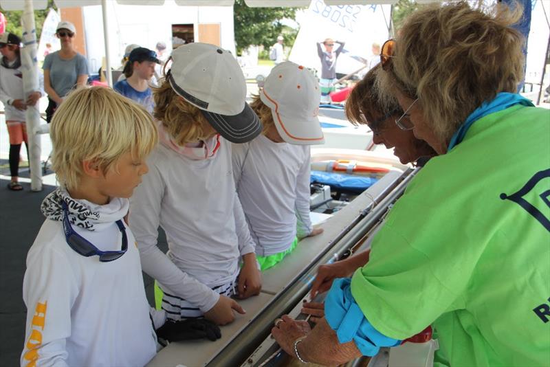 Organized by the USODA and Pensacola Yacht Club, 2018 Optimist Nationals began with measurement and check in  Over 400 young Opti sailors are expected to race in the Optimist National Championships Fleet Racing July 15-18 photo copyright Troy Gilbert taken at Pensacola Yacht Club and featuring the Optimist class