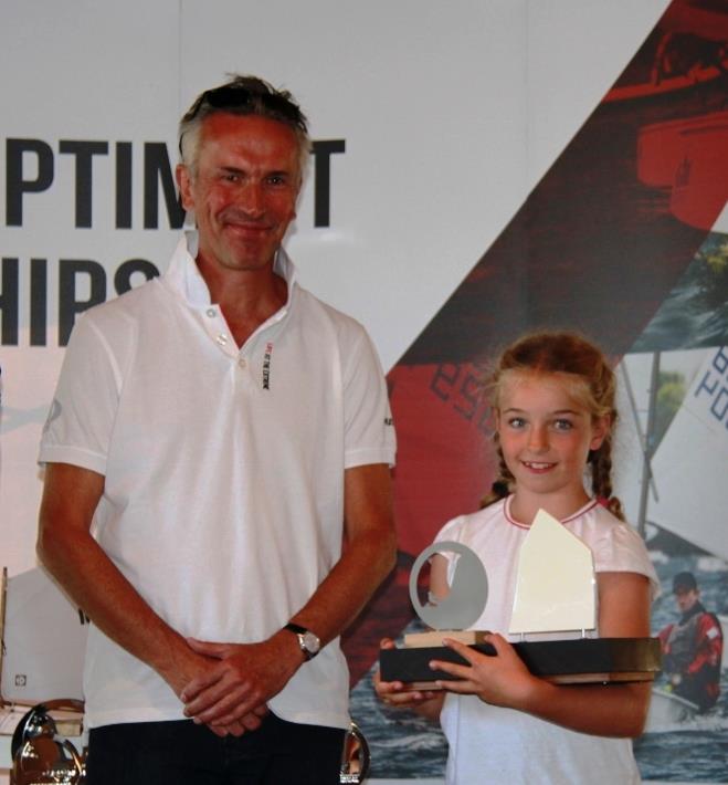 Volvo Car UK managing director Jon Wakefield with Tabitha Davies, first girl overall, at the Volvo Gill Optimist Late Summer Championship photo copyright IOCA UK taken at Poole Yacht Club and featuring the Optimist class