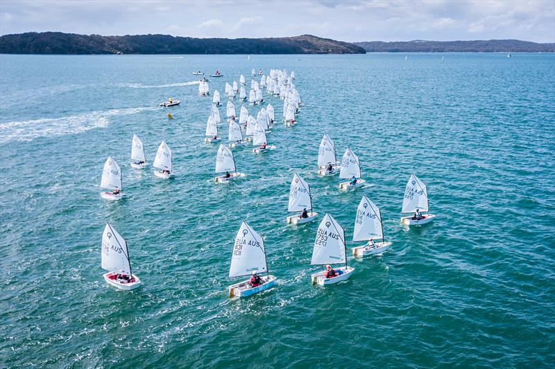 Optimist on day 2 of the NSW Youth Championship at Lake Macquarie photo copyright Beau Outteridge taken at South Lake Macquarie Amateur Sailing Club and featuring the Optimist class