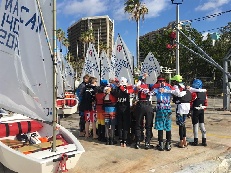 Pre-race huddle at the 2018 Miami Sailing Week photo copyright Miami Sailing Week taken at  and featuring the Optimist class