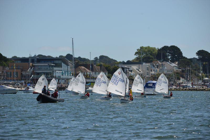 Coached Regatta fleet make their way to the start in the IOCA Southern Area Championships at Parkstone photo copyright Rob McCormick taken at Parkstone Yacht Club and featuring the Optimist class