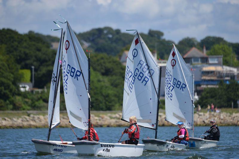 Having fun in the Coached Regatta fleet in the IOCA Southern Area Championships at Parkstone photo copyright Rob McCormick taken at Parkstone Yacht Club and featuring the Optimist class