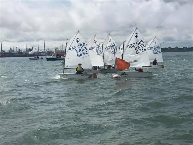 Evie Cumming port tacks the Regatta fleet in the Optimist open meeting at Warsash photo copyright Roger Cerrato taken at Warsash Sailing Club and featuring the Optimist class