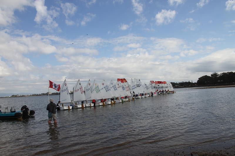 Catamaran and dinghy senior and junior fleet action at WinterBash photo copyright Mark Dawson taken at Humpybong Yacht Club and featuring the Optimist class